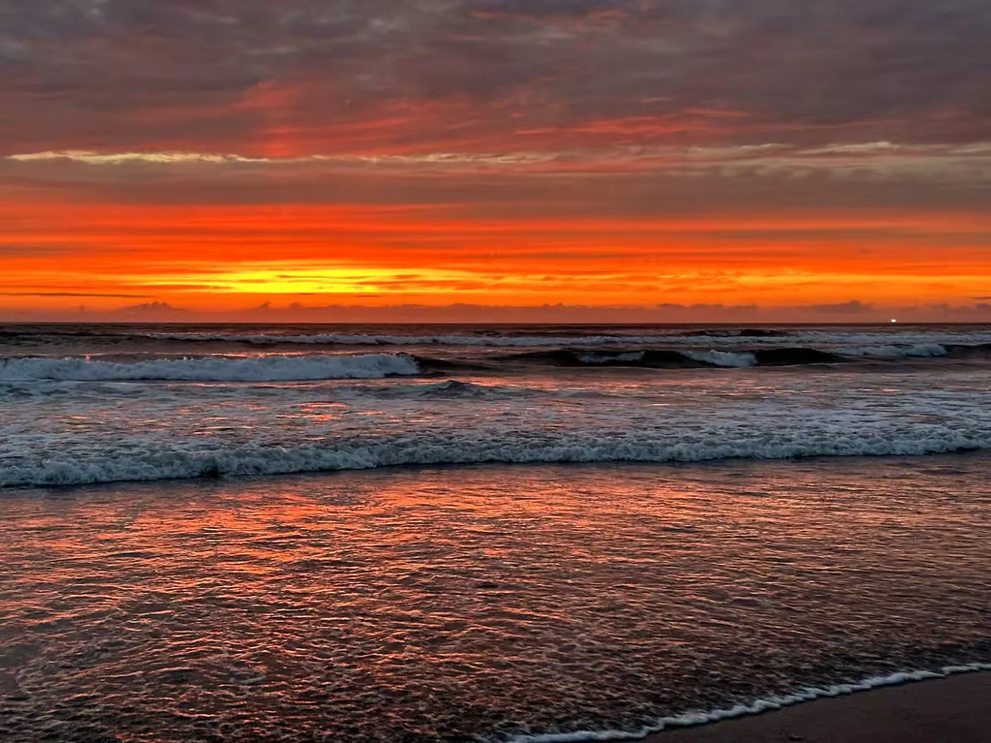 Crimson sunset over the Pacific from Manzanita Beach